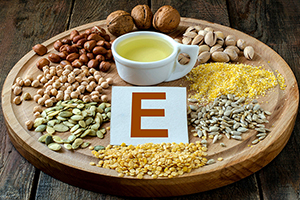 Good sources of vitamin E include olive oil, nuts, seeds and egg yolks.