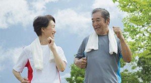 geriatric couple exercising
