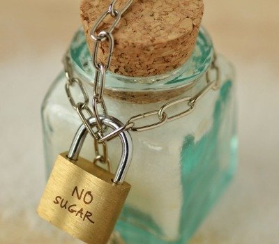 sugar jar wrapped in chain with padlock
